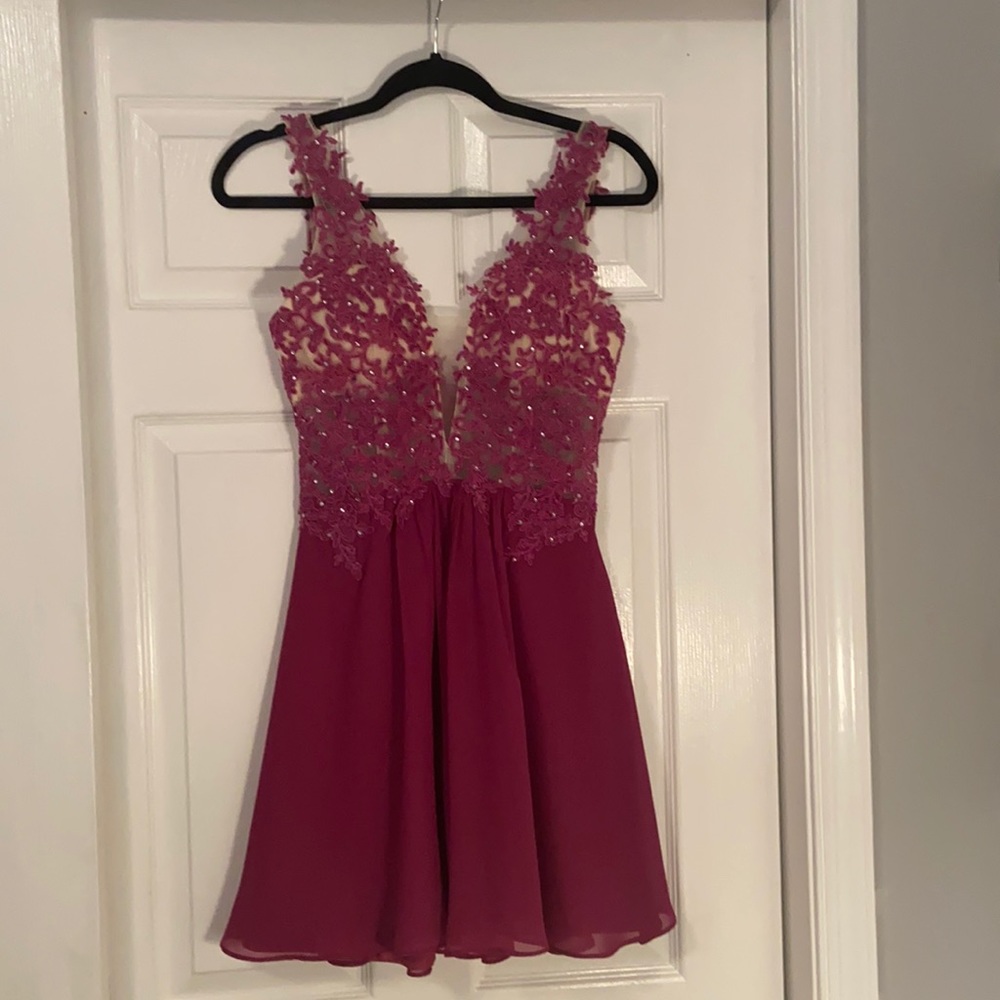 Fuchsia Jj’s house prom dress.